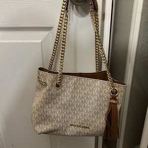 Michael kors handbag with gold hardware